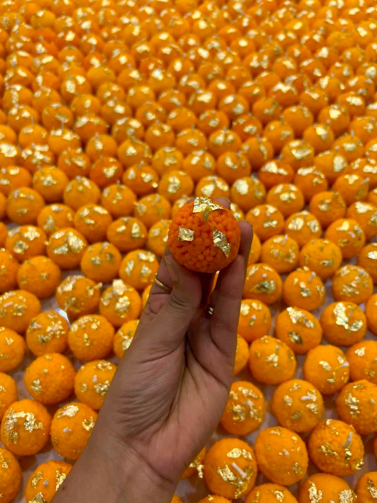 Hand‑poured Ladoo Soy Wax Aroma Candles (25gms), minimum set of 6. Inspired by India’s festive delicacy, these candles bring warmth, joy, and nostalgia with a clean eco‑friendly burn. Perfect for gifting, décor, and puja rituals.
